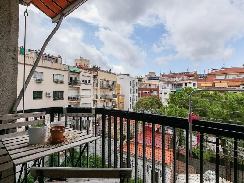 Светлая квартира с балконом в районе Эль-Путчет, Барселона. Фото:  5