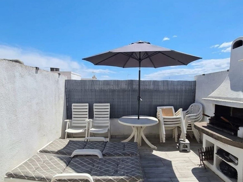 Cветлый двухуровневый апартамент в Pineda de Mar с большими террасами. Фото:  13