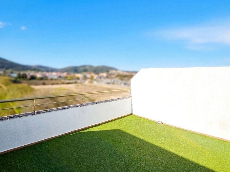 Cветлый двухуровневый апартамент в Pineda de Mar с большими террасами. Фото:  14