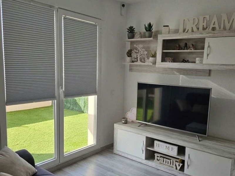 Cветлый двухуровневый апартамент в Pineda de Mar с большими террасами. Фото:  19